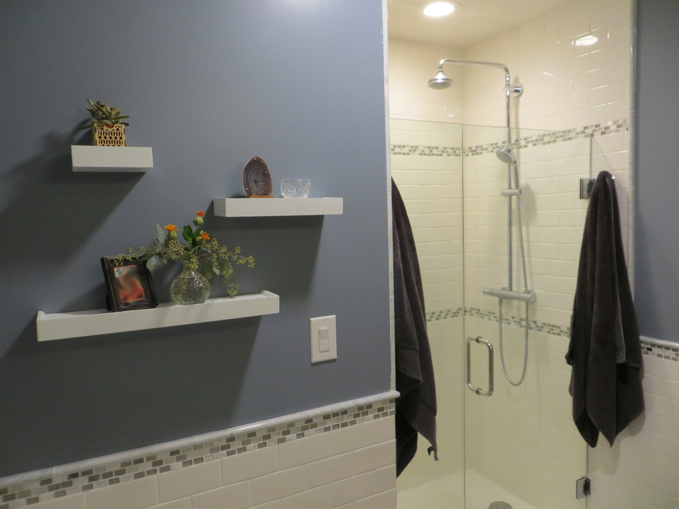 This is an example of a medium sized contemporary shower room bathroom in Kansas City with shaker cabinets, a two-piece toilet, white tiles, yellow tiles, marble flooring, a submerged sink, white cabinets, porcelain tiles, granite worktops, white floors and grey walls.