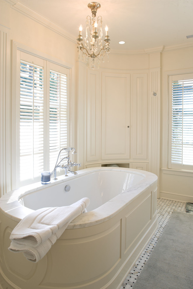 Bathroom - contemporary bathroom idea in Seattle with an undermount tub