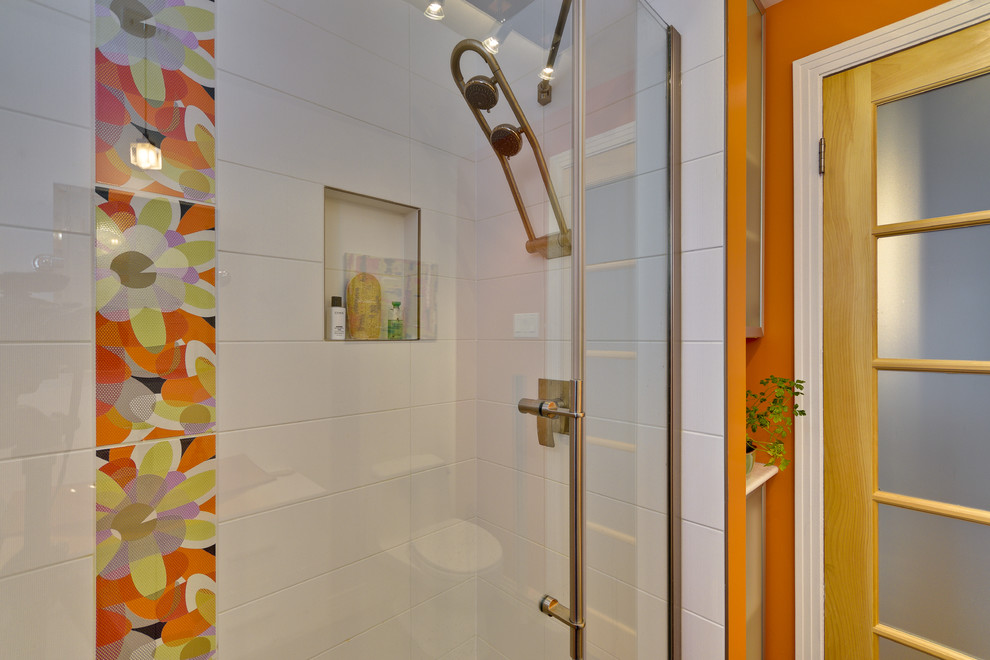 Design ideas for a small modern shower room bathroom in Montreal with flat-panel cabinets, white cabinets, an alcove shower, a one-piece toilet, white tiles, ceramic tiles, orange walls, dark hardwood flooring, a vessel sink, solid surface worktops, brown floors and a shower curtain.