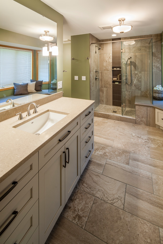 Inspiration for a medium sized classic ensuite bathroom in Minneapolis with recessed-panel cabinets, white cabinets, an alcove shower, a two-piece toilet, porcelain tiles, green walls, porcelain flooring, a submerged sink, quartz worktops, beige floors and a hinged door.