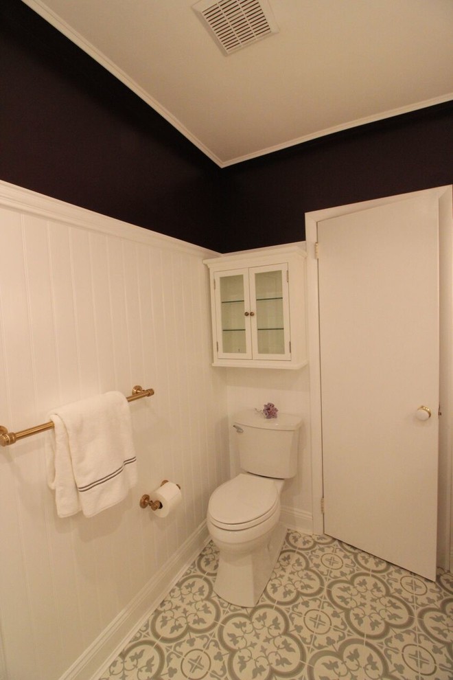 Bathroom - small transitional 3/4 white tile and ceramic tile ceramic tile and multicolored floor bathroom idea in Philadelphia with furniture-like cabinets, light wood cabinets, an undermount sink, marble countertops, a two-piece toilet, black walls and white countertops