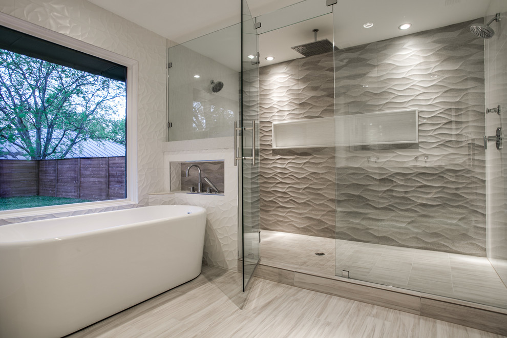 Design ideas for a large contemporary ensuite bathroom in Dallas with a submerged sink, a freestanding bath, a double shower, a two-piece toilet, grey tiles, porcelain tiles, white walls and porcelain flooring.