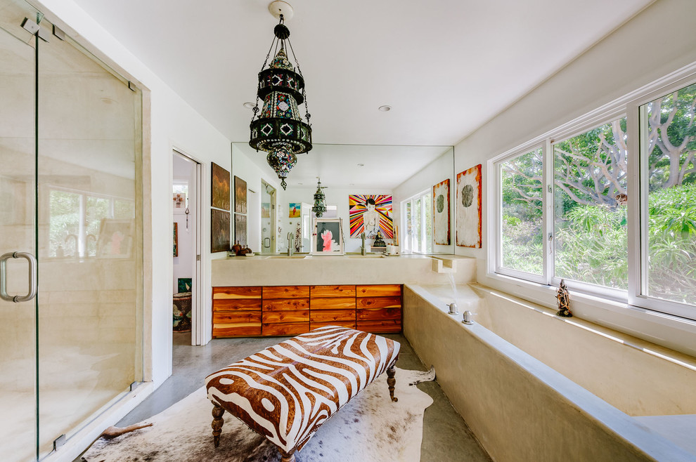 Inspiration for a mid-sized eclectic master concrete floor bathroom remodel in Los Angeles with white walls, an integrated sink, a hinged shower door, louvered cabinets, medium tone wood cabinets and concrete countertops
