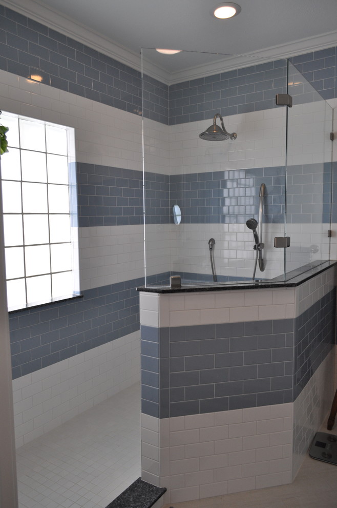 Example of a large 1950s master bathroom design in Houston with recessed-panel cabinets, white cabinets, multicolored walls and an undermount sink