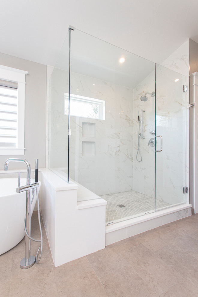 Inspiration for a large transitional master white tile and porcelain tile porcelain tile and gray floor bathroom remodel in Denver with raised-panel cabinets, white cabinets, a two-piece toilet, gray walls, an undermount sink, quartz countertops and a hinged shower door