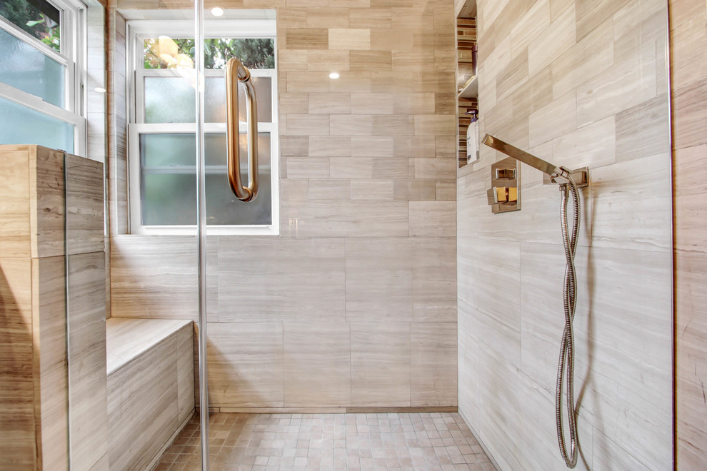 Inspiration for a medium sized traditional ensuite bathroom in Los Angeles with flat-panel cabinets, medium wood cabinets, an alcove shower, beige tiles, limestone tiles, beige walls, porcelain flooring, a submerged sink, engineered stone worktops, beige floors, a hinged door and beige worktops.