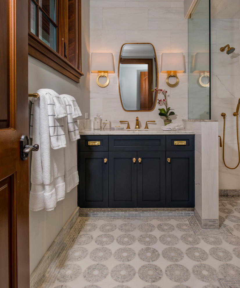 Bathroom - mid-sized mediterranean 3/4 white tile and porcelain tile mosaic tile floor and gray floor bathroom idea in Other with shaker cabinets, blue cabinets, white walls, an undermount sink and white countertops