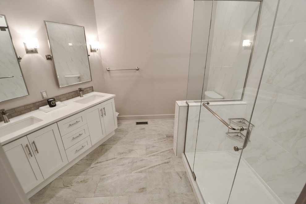Marble Wall Master Bathroom Redesign Before & After Modern