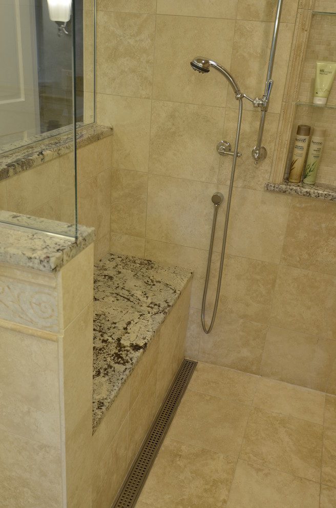 Inspiration for a timeless master beige tile and stone tile travertine floor bathroom remodel in Cleveland with an undermount sink, beaded inset cabinets, white cabinets, granite countertops and beige walls