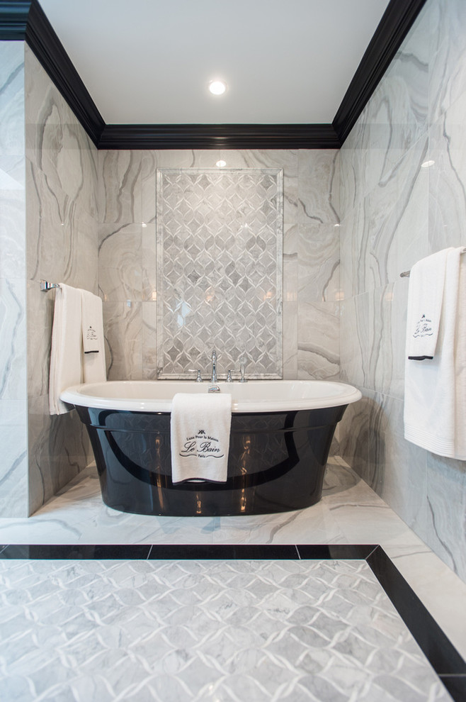 Bathroom - large master black and white tile and stone tile marble floor bathroom idea in Vancouver with an undermount sink, raised-panel cabinets, dark wood cabinets, marble countertops, a one-piece toilet and multicolored walls