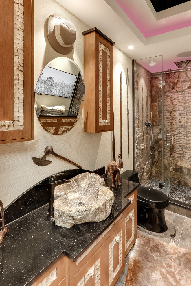 Eclectic alcove shower photo in New York with a one-piece toilet, beige walls, a vessel sink, a hinged shower door and blue countertops