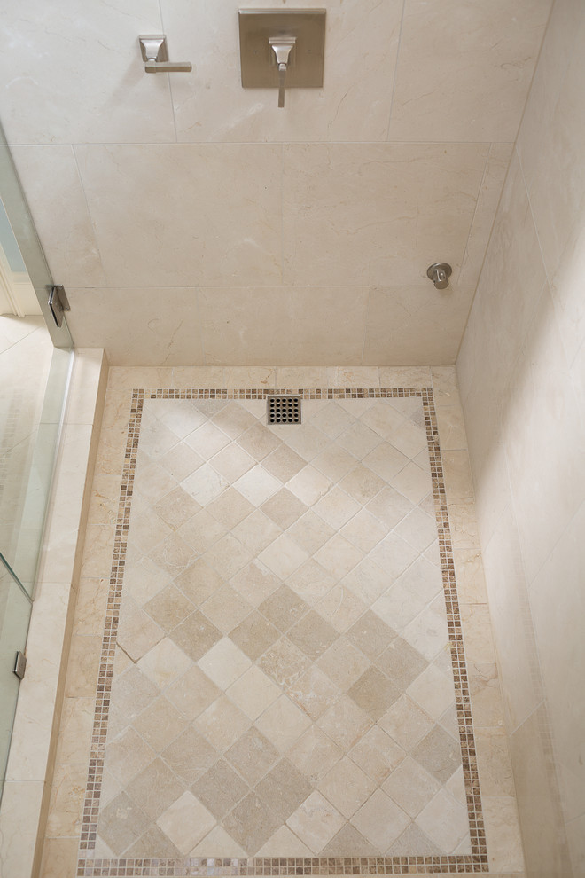 Example of a mid-sized classic master beige tile and stone tile marble floor double shower design in Atlanta with an undermount sink, flat-panel cabinets, white cabinets, marble countertops, a two-piece toilet and blue walls
