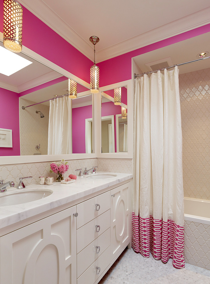 Design ideas for a traditional family bathroom in San Francisco with a submerged sink, a built-in bath, a shower/bath combination, beige tiles, pink walls and white cabinets.