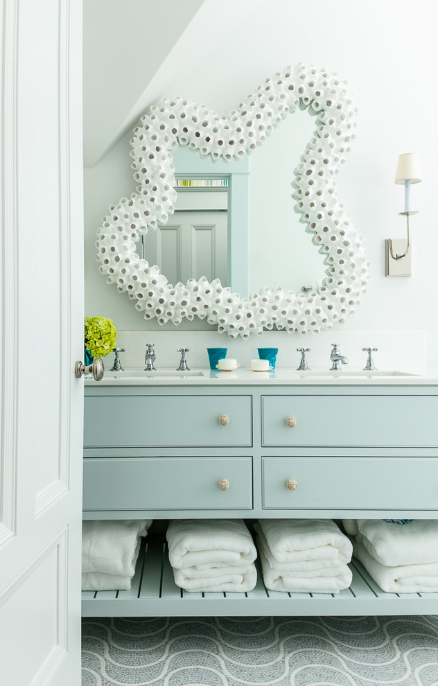 Inspiration for a mid-sized coastal master mosaic tile floor bathroom remodel in Boston with an undermount sink, furniture-like cabinets, blue cabinets, marble countertops and white walls