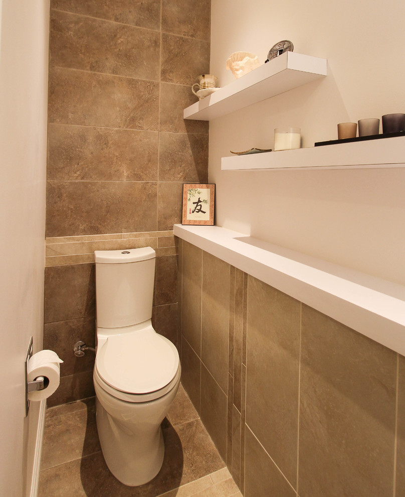 Example of a small zen 3/4 green tile and ceramic tile ceramic tile bathroom design in Toronto with flat-panel cabinets, dark wood cabinets, a two-piece toilet, white walls, a drop-in sink and solid surface countertops