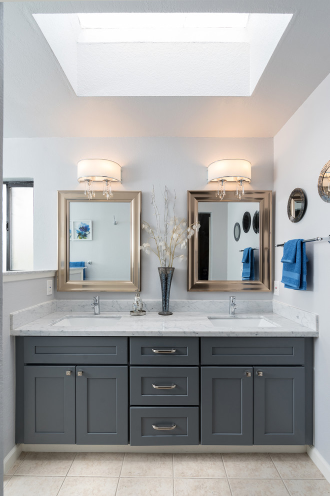 Bathroom - large transitional master white tile and marble tile travertine floor and beige floor bathroom idea in Other with shaker cabinets, gray cabinets, a two-piece toilet, beige walls, an undermount sink, quartzite countertops and white countertops