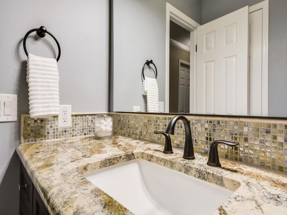 Design ideas for a medium sized classic ensuite bathroom in Austin with shaker cabinets, dark wood cabinets, beige tiles, blue walls, marble flooring, a submerged sink and granite worktops.