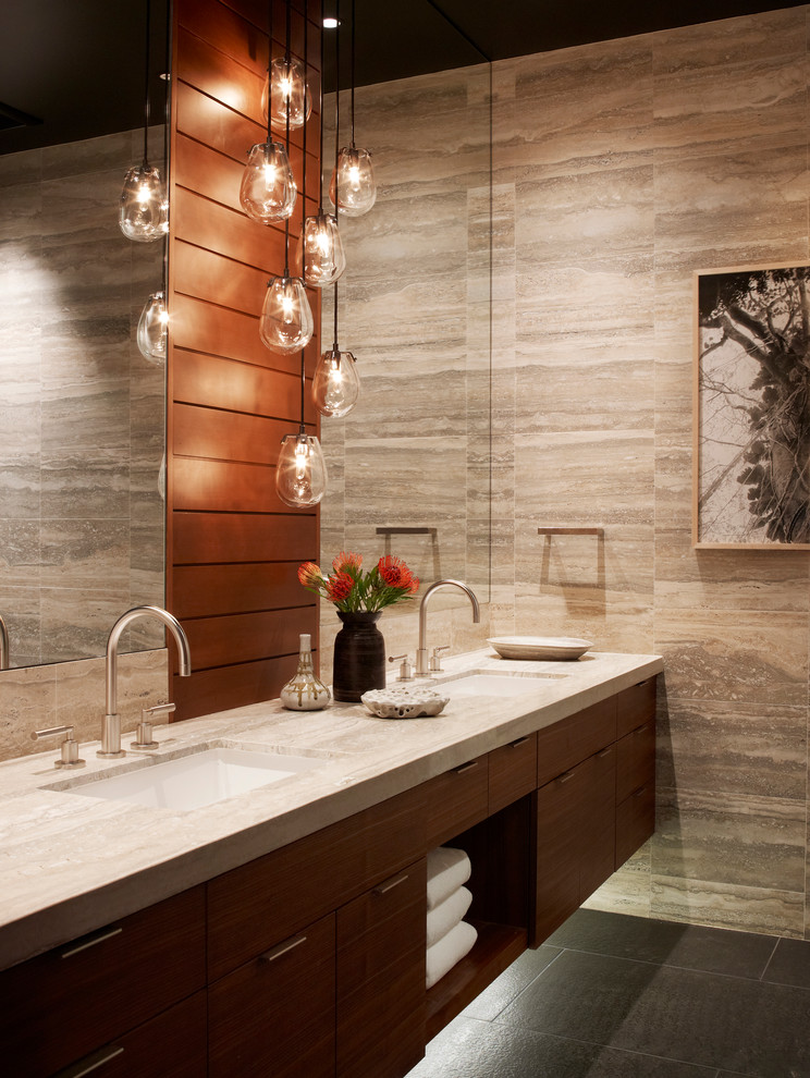 Inspiration for a contemporary beige tile bathroom remodel in Sacramento with flat-panel cabinets, medium tone wood cabinets and an undermount sink