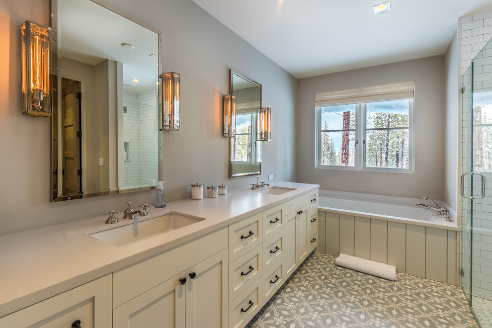 Walk-in shower - mid-sized transitional master gray tile and subway tile ceramic tile walk-in shower idea in Sacramento with shaker cabinets, beige cabinets, an undermount tub, a one-piece toilet, gray walls, a drop-in sink, quartz countertops and a hinged shower door