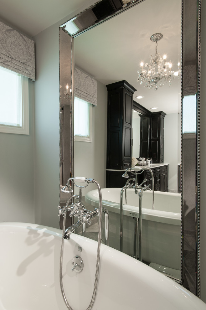 Bathroom - mid-sized traditional master white tile and stone tile marble floor bathroom idea in St Louis with an undermount sink, raised-panel cabinets, black cabinets, marble countertops and gray walls