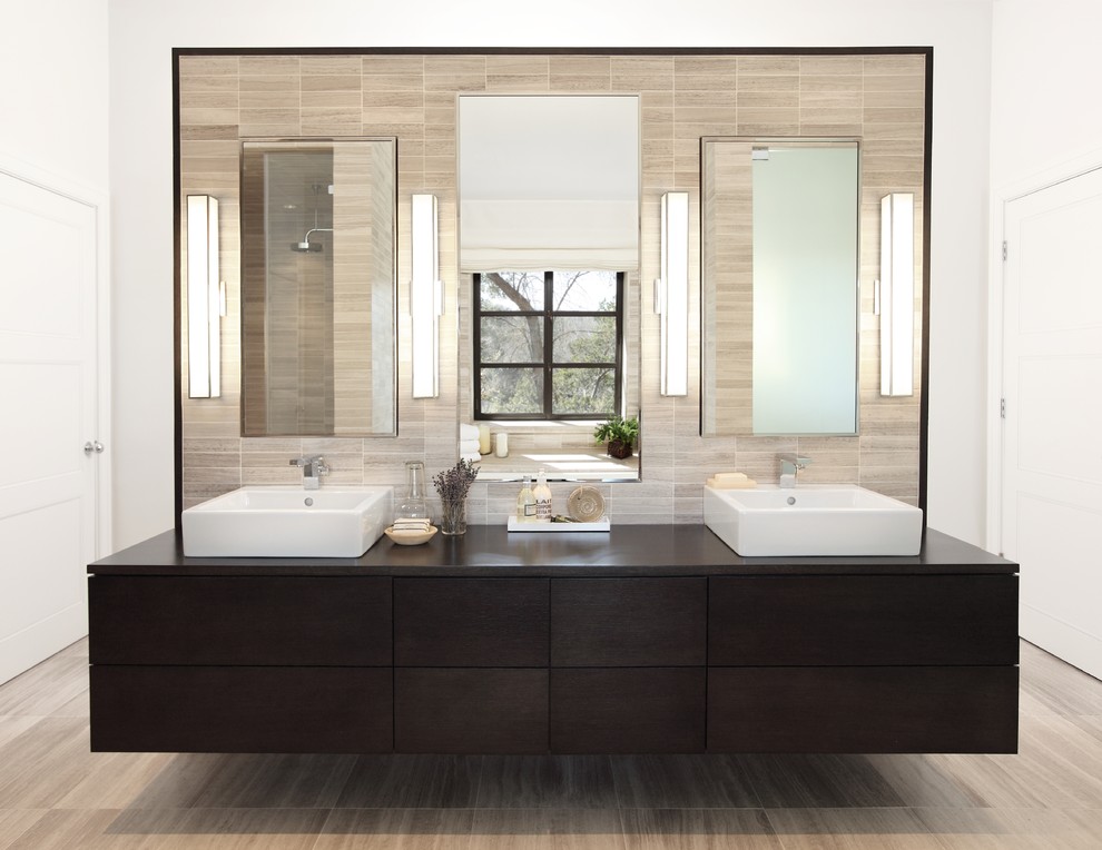Inspiration for a contemporary bathroom remodel in Austin with a vessel sink
