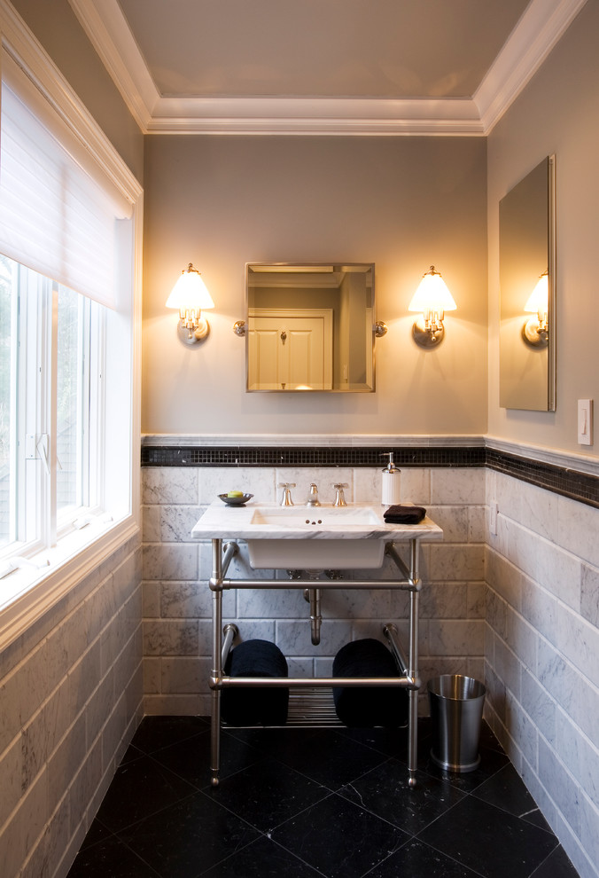 Example of a mid-sized classic master stone tile and white tile marble floor double shower design in New York with marble countertops, a console sink, gray walls, a one-piece toilet and open cabinets