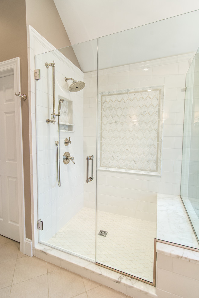 Example of a large classic master white tile and porcelain tile porcelain tile bathroom design in Philadelphia with raised-panel cabinets, white cabinets, a two-piece toilet, beige walls, an undermount sink and marble countertops