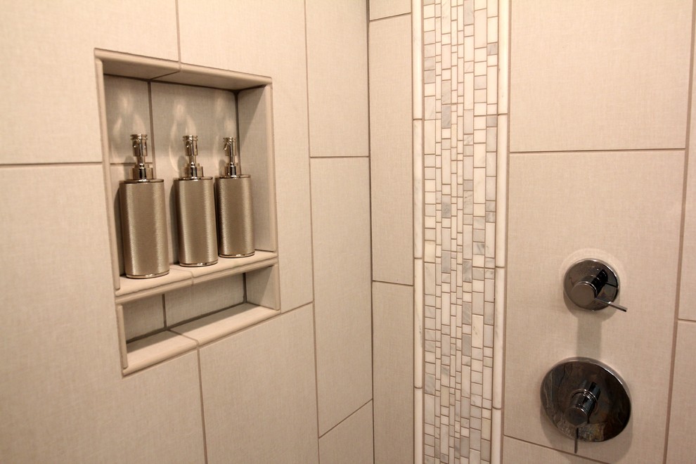 This is an example of a medium sized contemporary ensuite bathroom in Other with ceramic tiles, ceramic flooring, quartz worktops, shaker cabinets, grey cabinets, an alcove shower, a two-piece toilet, beige tiles, grey tiles, grey walls and a submerged sink.