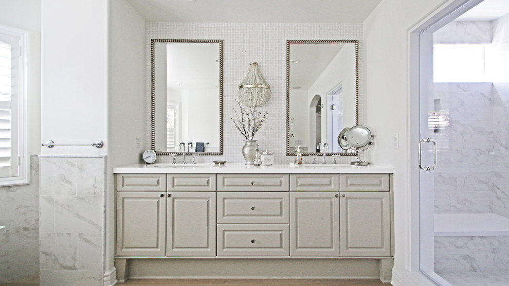 Inspiration for a medium sized contemporary ensuite bathroom in Orange County with double sinks and a built in vanity unit.