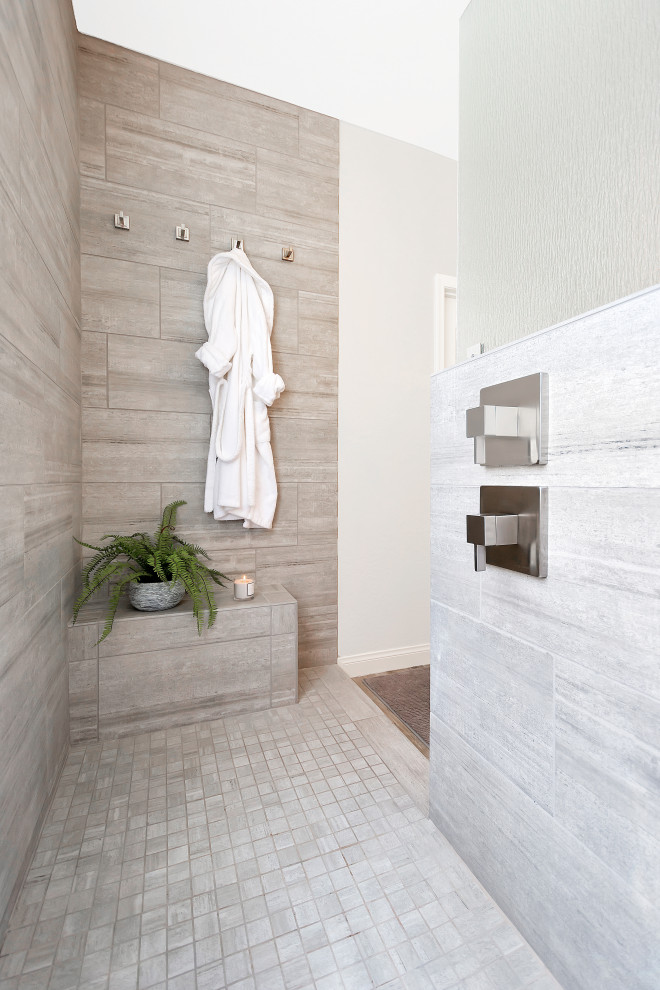Inspiration for a medium sized classic ensuite bathroom in Phoenix with raised-panel cabinets, grey cabinets, a walk-in shower, grey tiles, porcelain tiles, grey walls, porcelain flooring, a submerged sink, granite worktops, grey floors, an open shower, grey worktops, a shower bench, double sinks and a built in vanity unit.