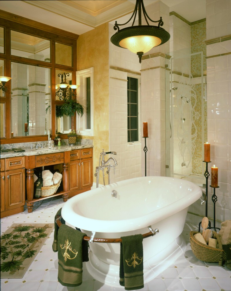 This is an example of a traditional bathroom in Miami with a freestanding bath.