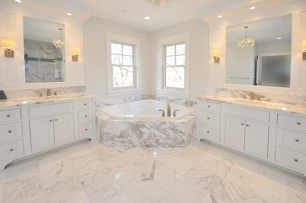 Inspiration for a mid-sized timeless master white tile and stone tile marble floor and white floor bathroom remodel in DC Metro with recessed-panel cabinets, white cabinets, a two-piece toilet, white walls, a drop-in sink and marble countertops