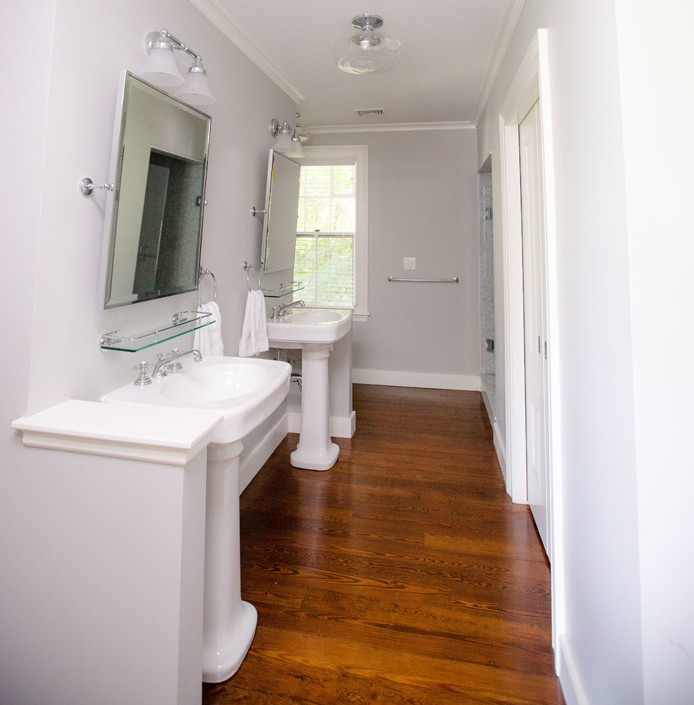 Large elegant master dark wood floor alcove shower photo in Boston with gray walls and a pedestal sink