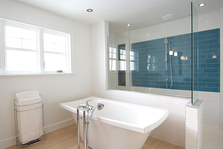 Large southwest master white tile and porcelain tile light wood floor bathroom photo in Montreal with white walls