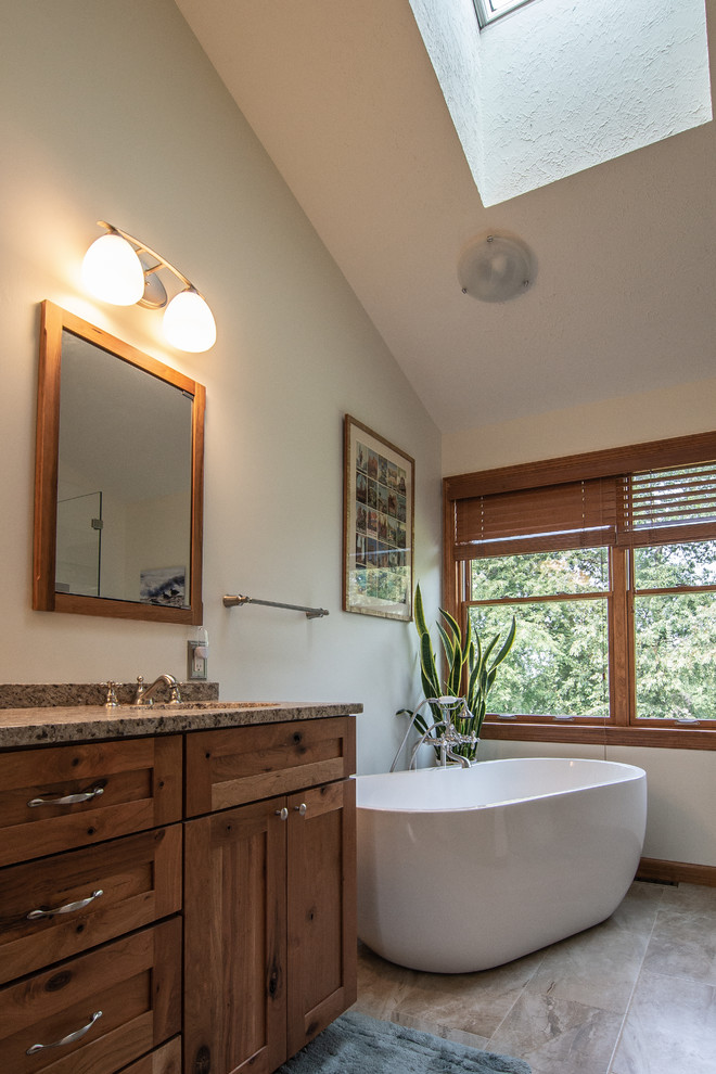 Master bath featuring a rustic character cherry vanity Rustic