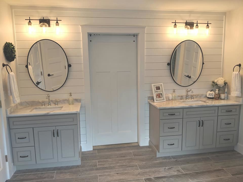 Example of a mid-sized farmhouse master gray tile and porcelain tile porcelain tile and gray floor bathroom design in Raleigh with flat-panel cabinets, gray cabinets, gray walls, an undermount sink, marble countertops, a hinged shower door and yellow countertops