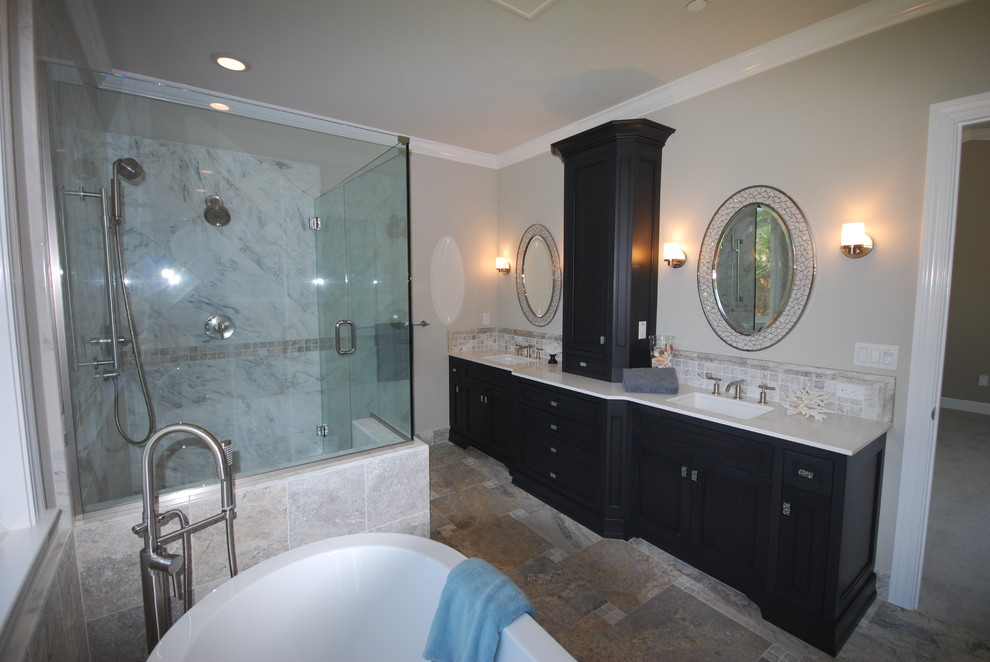 Mid-sized transitional master white tile and stone tile limestone floor bathroom photo in San Francisco with shaker cabinets, beige walls, an undermount sink, black cabinets and quartz countertops