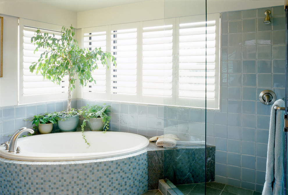 Inspiration for a mid-sized contemporary master green tile and ceramic tile slate floor and green floor bathroom remodel in San Francisco with an undermount sink, granite countertops, white walls, open cabinets, a one-piece toilet and a hinged shower door