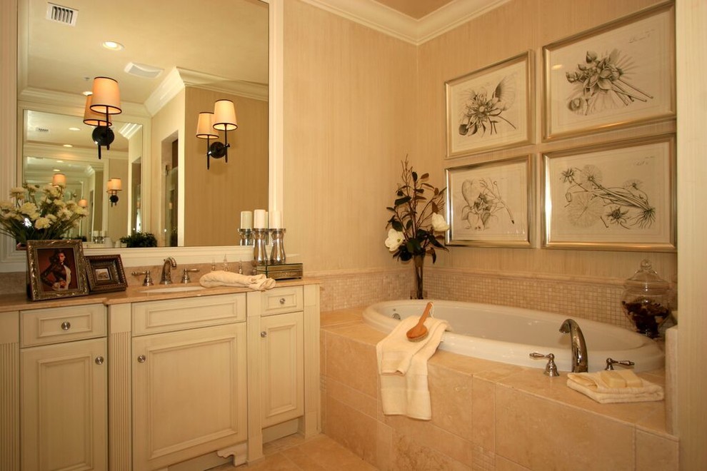 Mid-sized tuscan master beige tile and mosaic tile ceramic tile bathroom photo in Miami with beaded inset cabinets, white cabinets, an undermount tub, beige walls and granite countertops