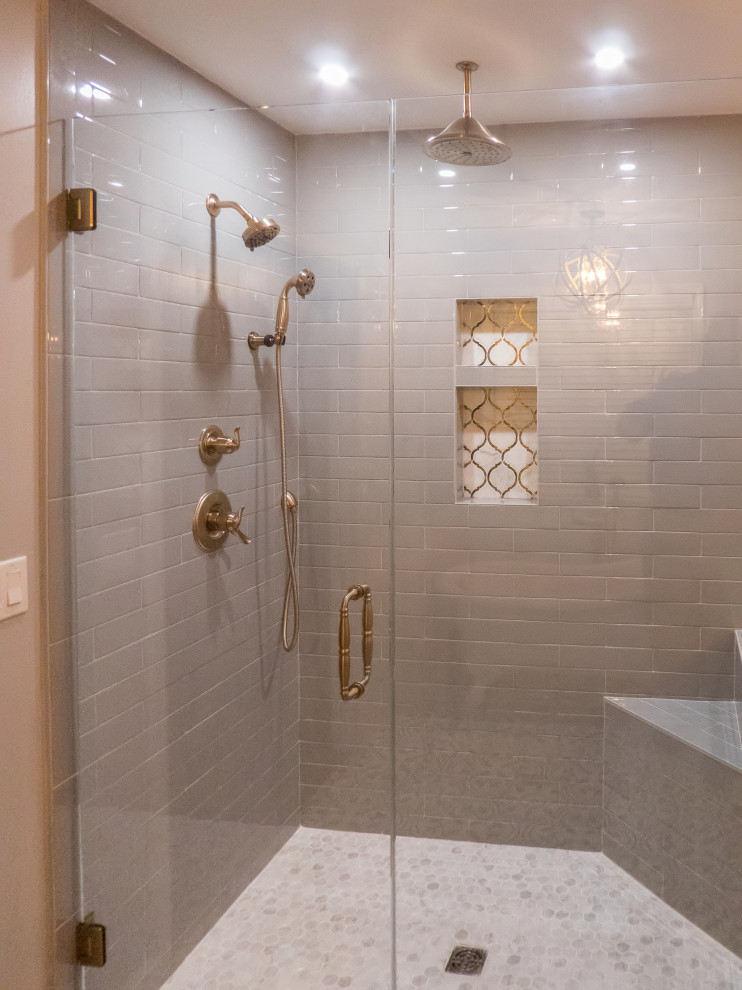 Medium sized classic ensuite bathroom in Atlanta with shaker cabinets, brown cabinets, a claw-foot bath, a double shower, a two-piece toilet, grey tiles, metro tiles, grey walls, terracotta flooring, a submerged sink, engineered stone worktops, multi-coloured floors, a hinged door and white worktops.