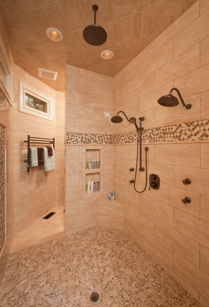 Photo of a traditional bathroom in Raleigh with a double shower.