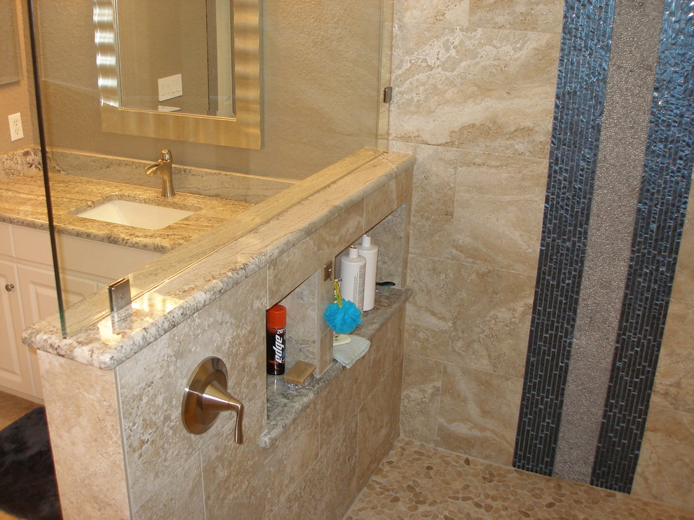 Mid-sized trendy 3/4 beige tile corner shower photo in Tampa with an undermount sink, shaker cabinets, white cabinets and brown walls
