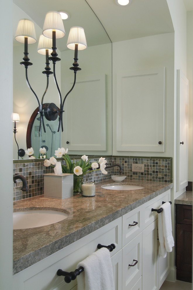 Inspiration for a timeless multicolored tile and mosaic tile bathroom remodel in Houston with an undermount sink, recessed-panel cabinets and white cabinets