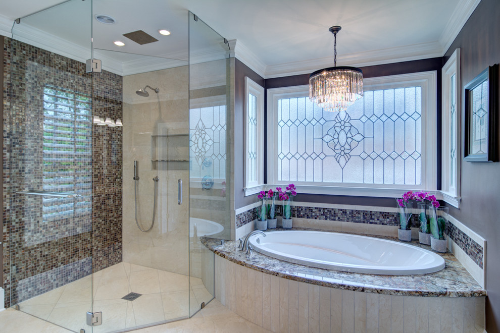 Inspiration for a huge transitional master multicolored tile and mosaic tile porcelain tile bathroom remodel in Atlanta with an undermount sink, raised-panel cabinets, dark wood cabinets, granite countertops and brown walls