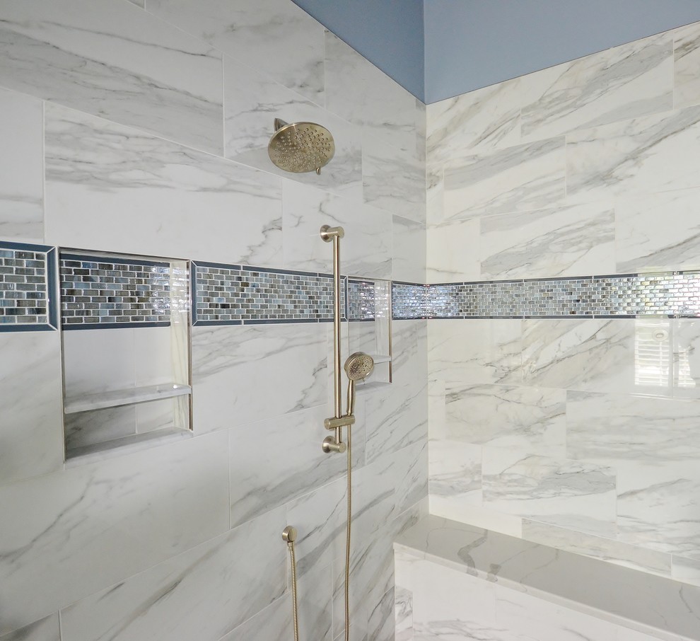 Large transitional master multicolored tile and marble tile ceramic tile and gray floor bathroom photo in Philadelphia with recessed-panel cabinets, white cabinets, a one-piece toilet, blue walls, an undermount sink and quartz countertops