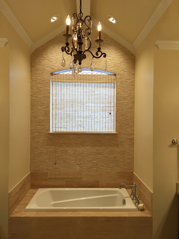 Example of a large minimalist master beige tile and stone tile travertine floor bathroom design in Dallas with an undermount sink, shaker cabinets, dark wood cabinets, marble countertops, a two-piece toilet and beige walls