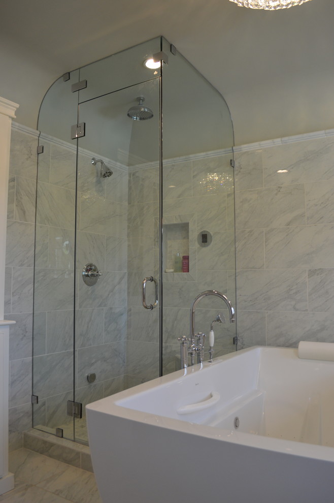 Medium sized classic ensuite bathroom in Los Angeles with recessed-panel cabinets, white cabinets, a freestanding bath, a corner shower, a bidet, grey tiles, porcelain tiles, grey walls, porcelain flooring, a submerged sink and quartz worktops.
