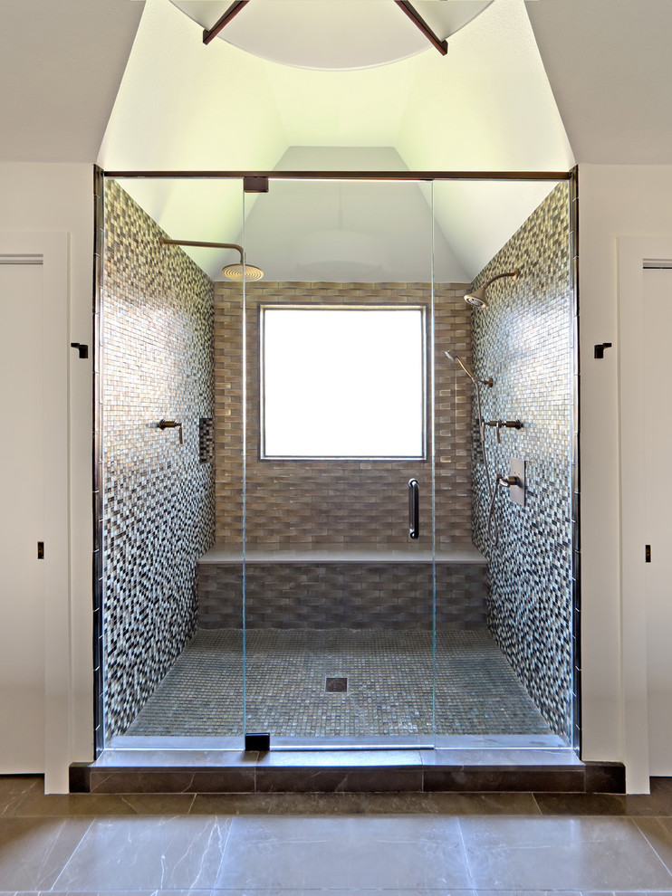 Mid-sized trendy master multicolored tile and glass tile marble floor double shower photo in Dallas with an undermount sink, flat-panel cabinets, medium tone wood cabinets, quartz countertops, a two-piece toilet and white walls