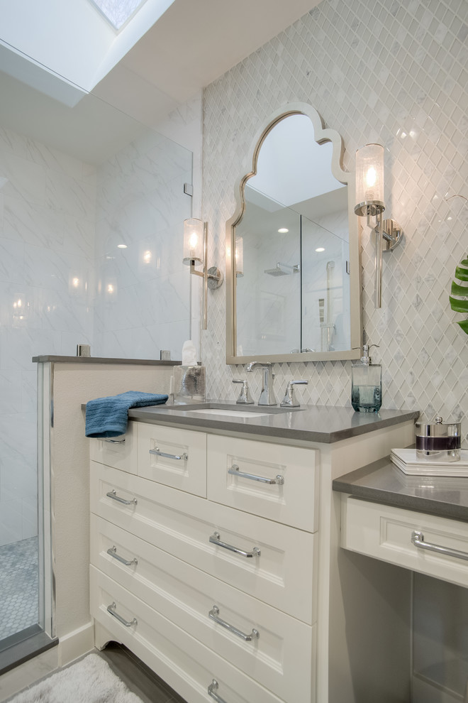 Design ideas for a small classic ensuite bathroom in Dallas with shaker cabinets, white cabinets, a corner shower, a two-piece toilet, grey tiles, glass tiles, grey walls, porcelain flooring, a submerged sink, engineered stone worktops, grey floors and a hinged door.