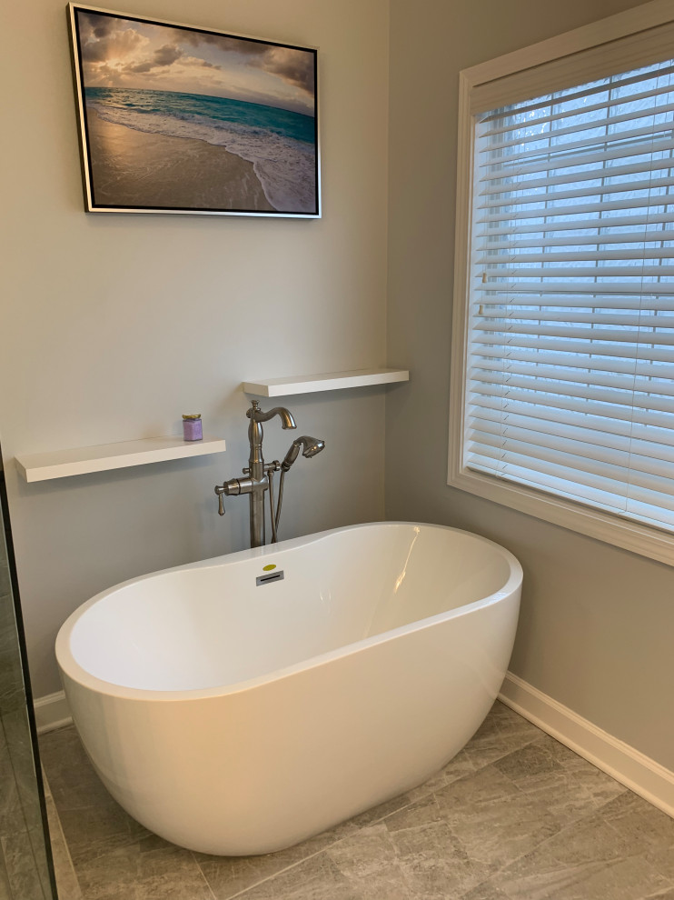 Medium sized classic ensuite bathroom in Atlanta with shaker cabinets, white cabinets, a freestanding bath, a corner shower, a two-piece toilet, grey tiles, porcelain tiles, grey walls, terracotta flooring, a submerged sink, engineered stone worktops, grey floors, a hinged door and white worktops.